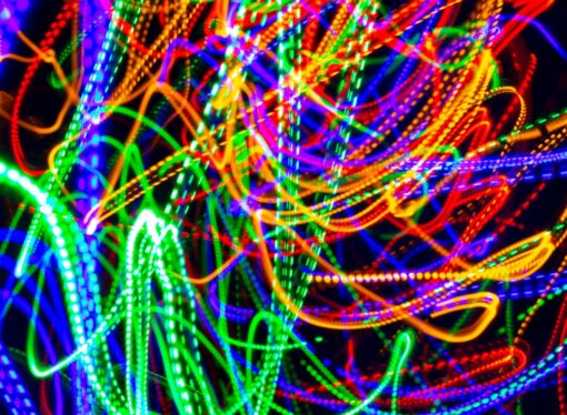 Harnessing Quantum Superradiance for Stable Microwave Signal Generation